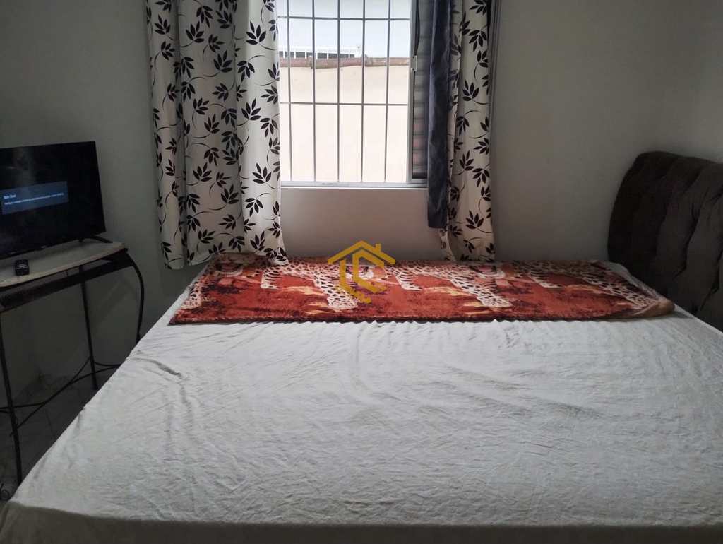 Casa em Praia Grande, no bairro Caiçara