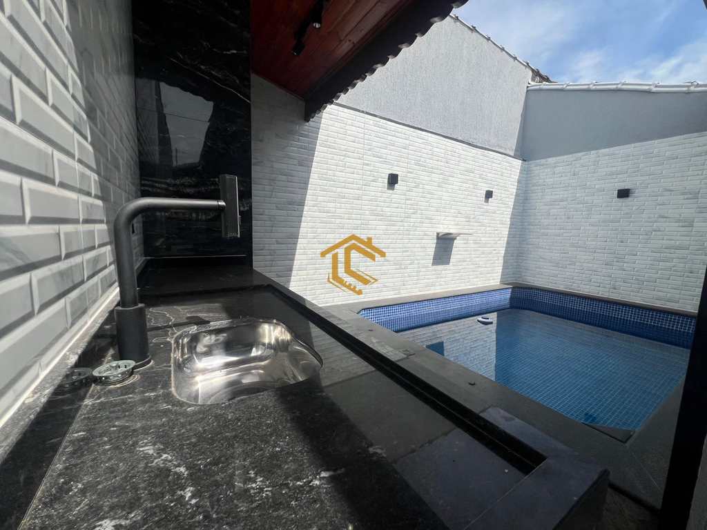 Casa em Praia Grande, no bairro Real