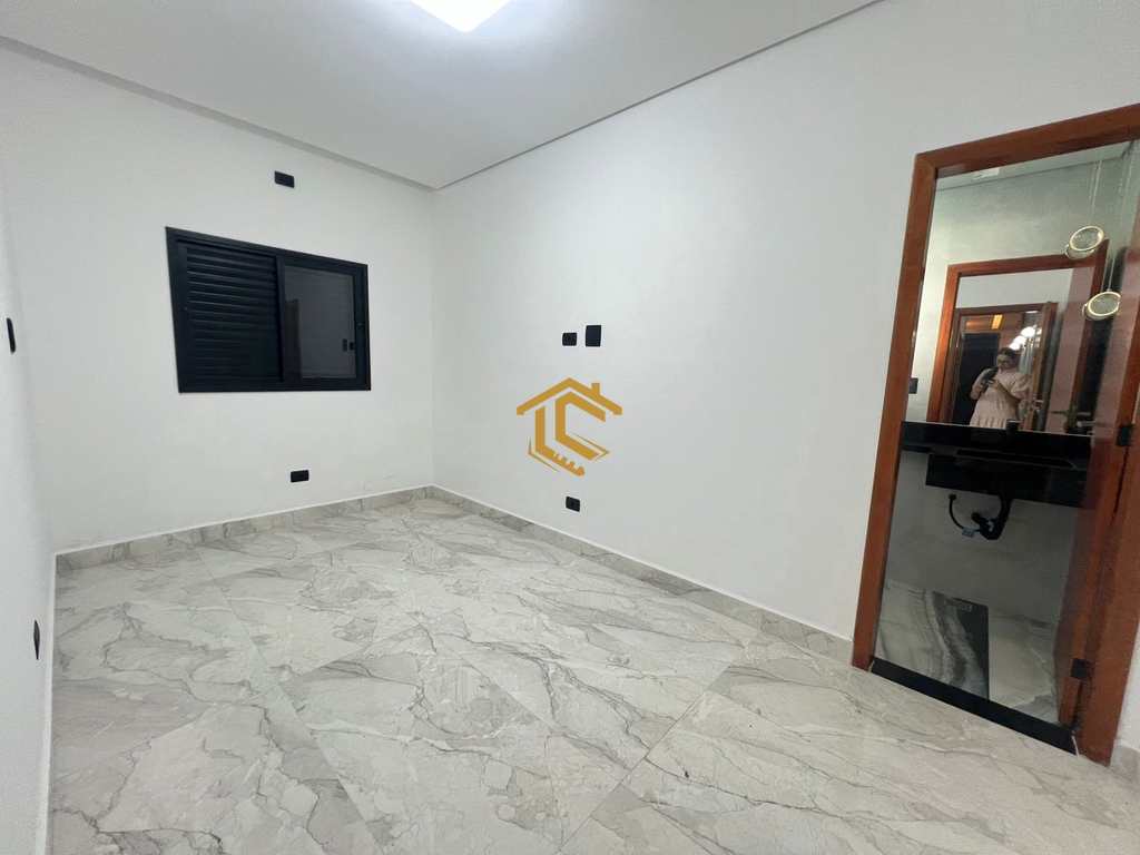 Casa em Praia Grande, no bairro Real