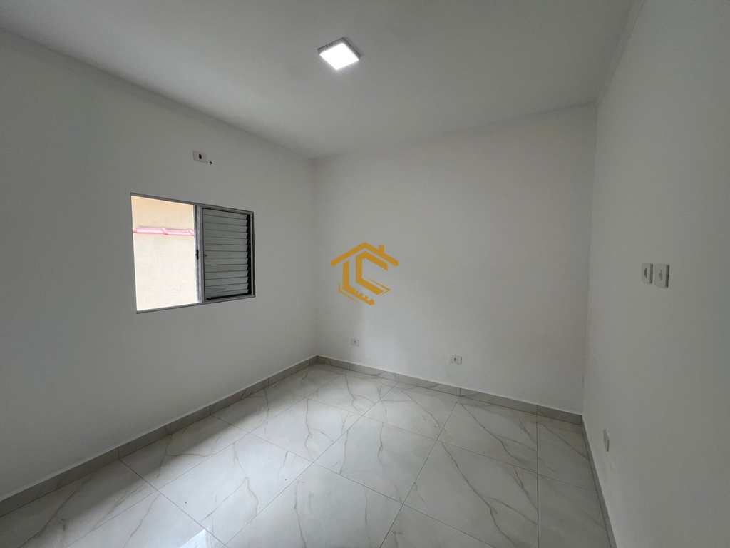 Casa em Praia Grande, no bairro Caiçara