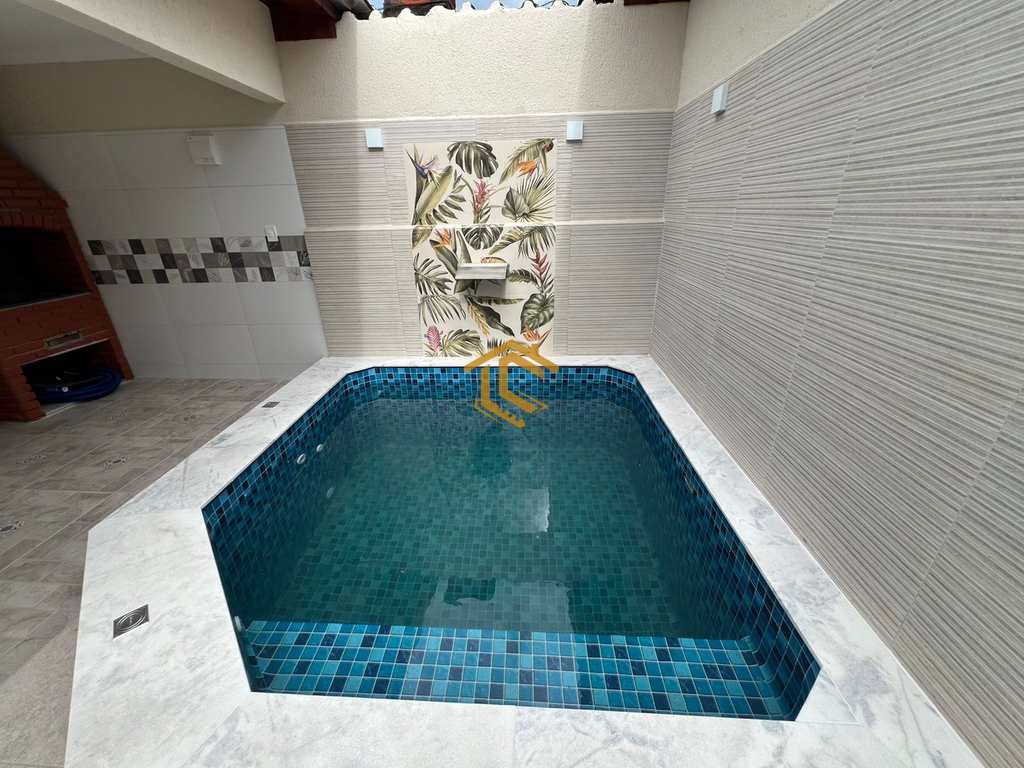 Casa em Praia Grande, no bairro Caiçara