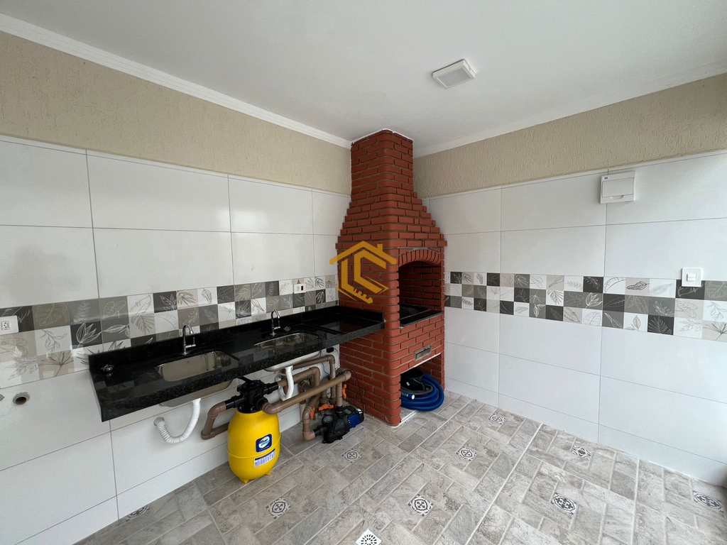 Casa em Praia Grande, no bairro Caiçara