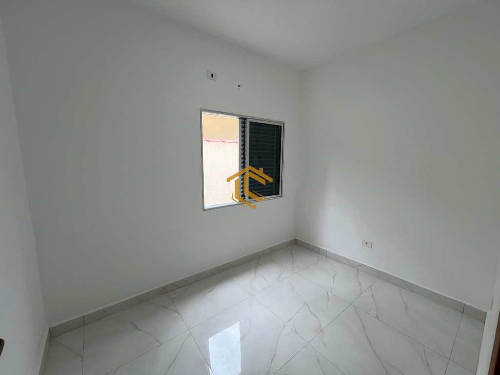 Casa em Praia Grande, no bairro Caiçara