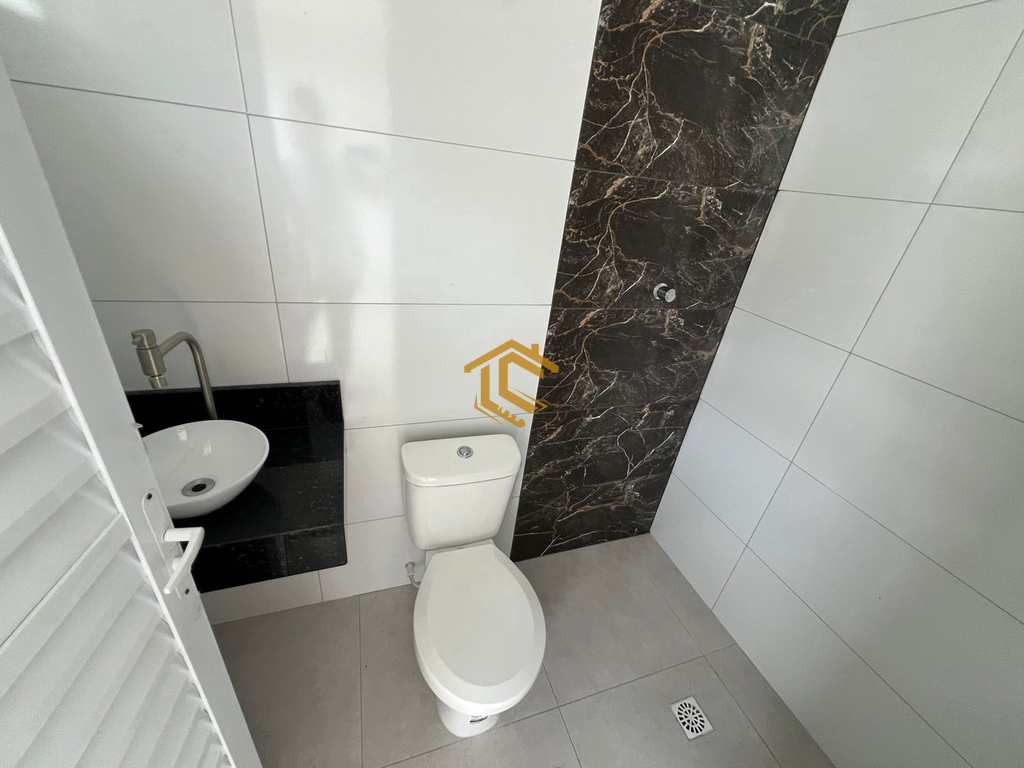 Casa em Praia Grande, no bairro Caiçara