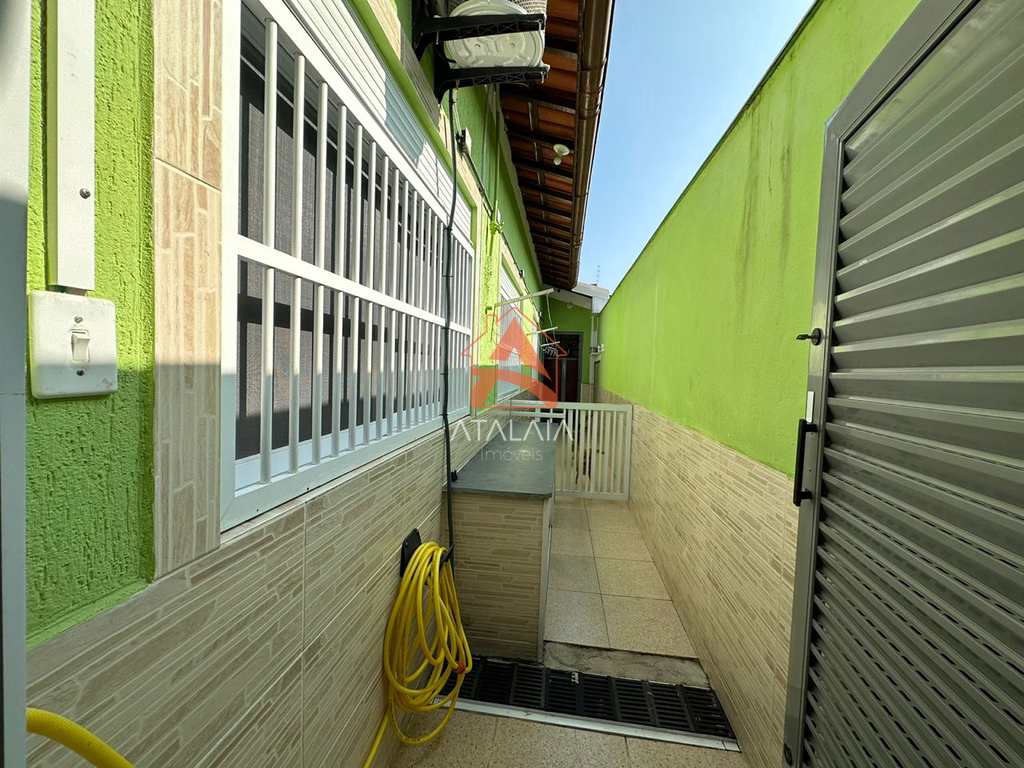 Casa em Praia Grande, no bairro Real