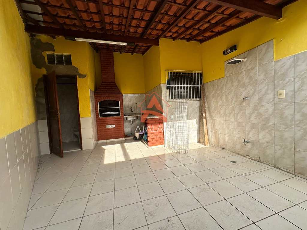 Casa em Praia Grande, no bairro Caiçara