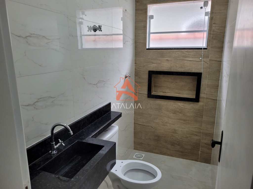 Casa em Praia Grande, no bairro Real