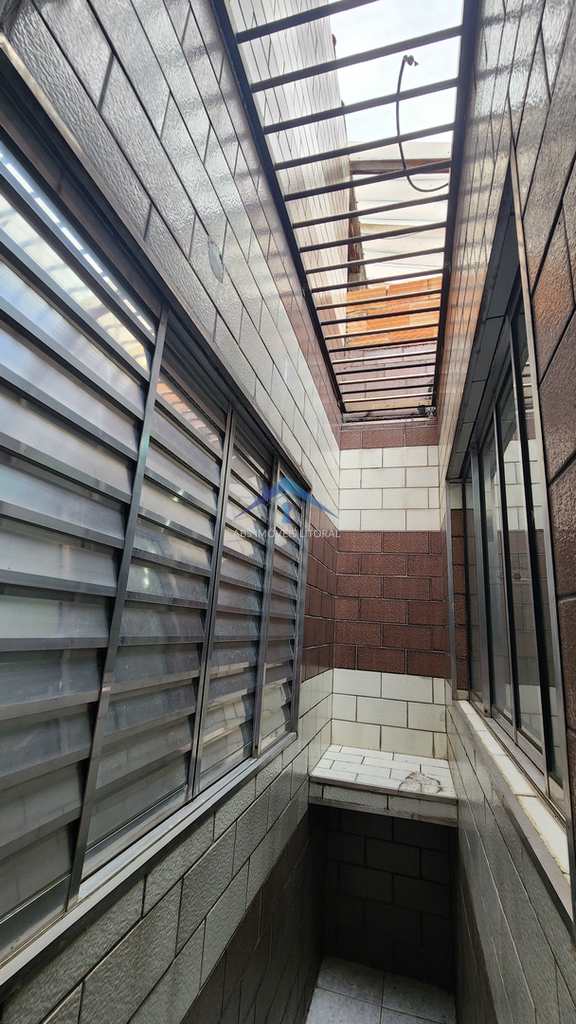 Casa em Praia Grande, no bairro Caiçara