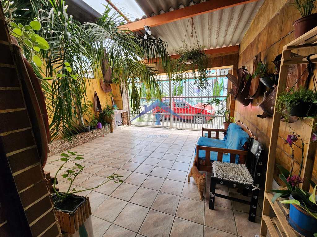 Casa em Praia Grande, no bairro Caiçara