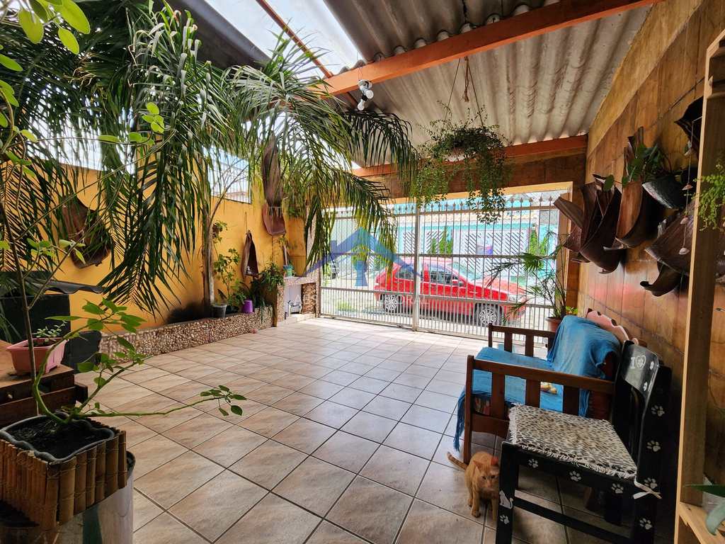 Casa em Praia Grande, no bairro Caiçara