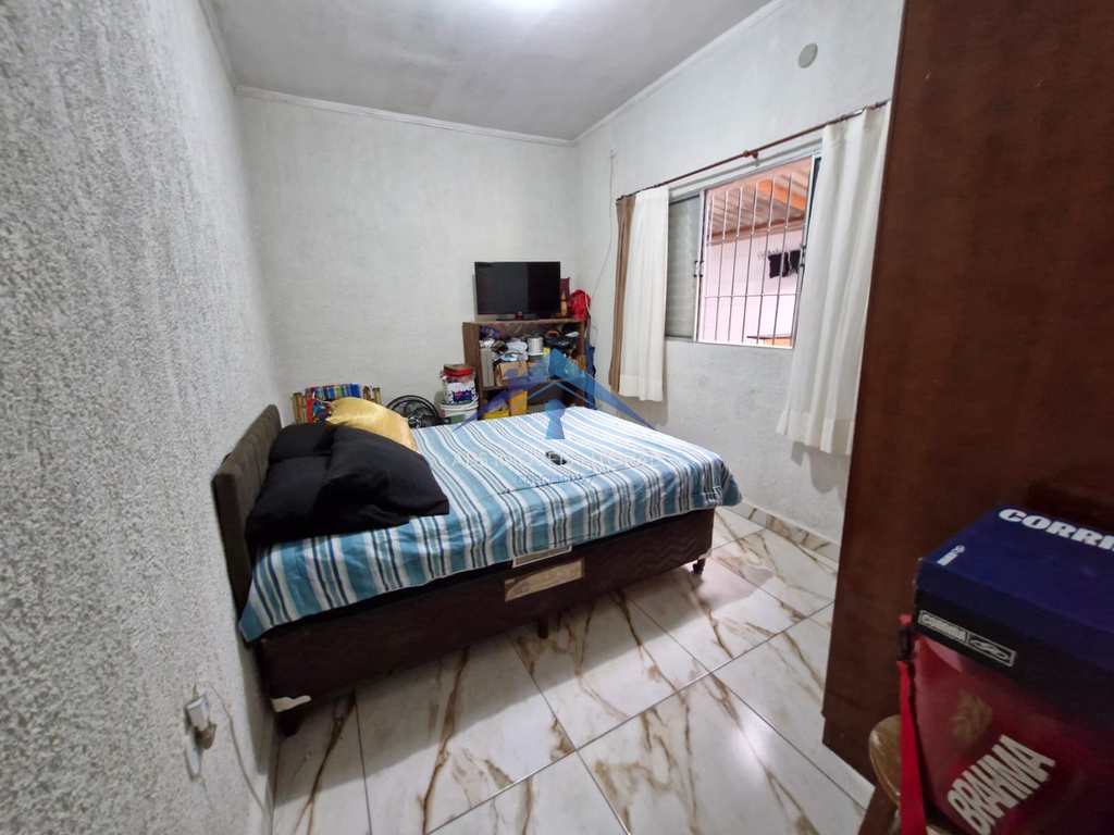 Casa em Praia Grande, no bairro Caiçara