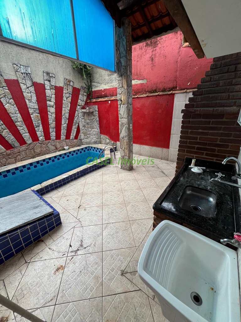 Casa em Praia Grande, no bairro Caiçara