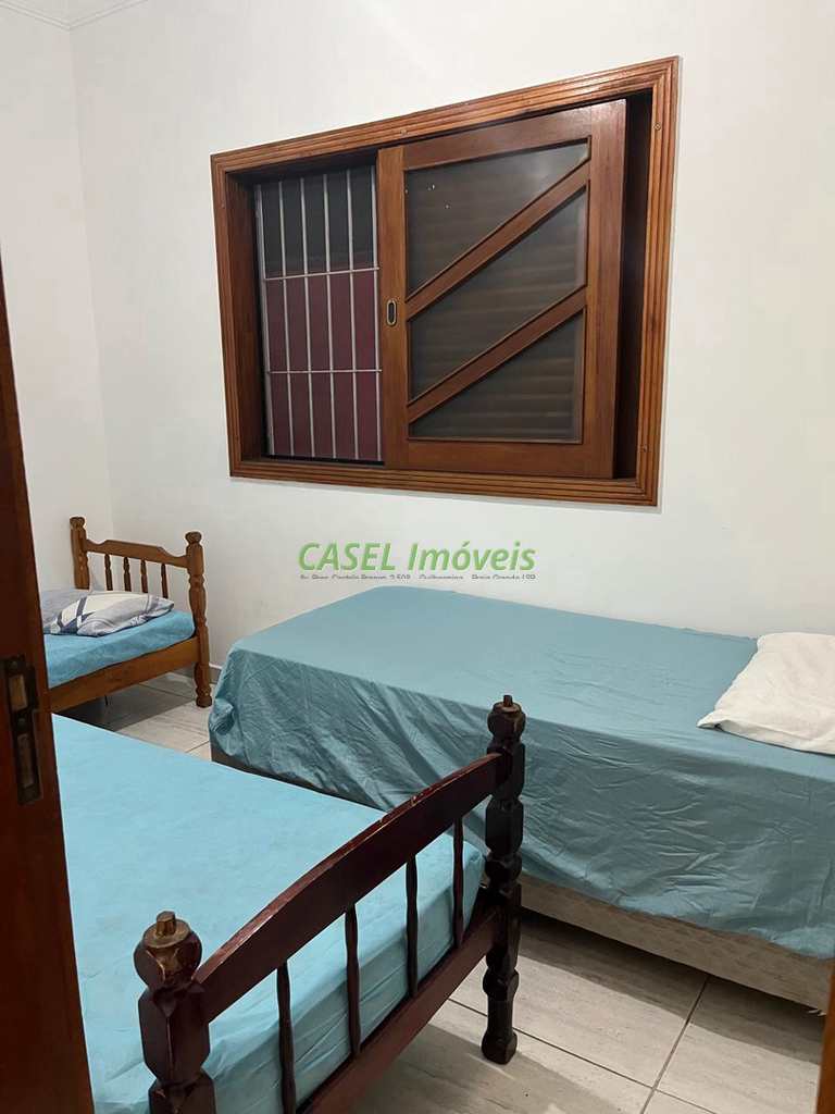 Casa em Praia Grande, no bairro Caiçara