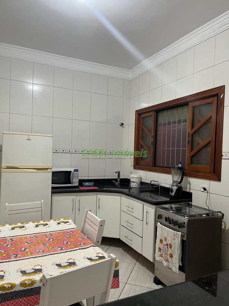 Casa em Praia Grande, no bairro Caiçara