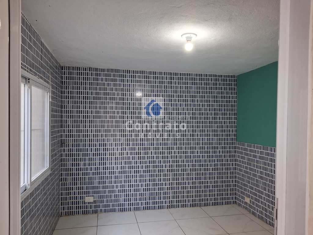 Casa em São Vicente, no bairro Vila Voturua
