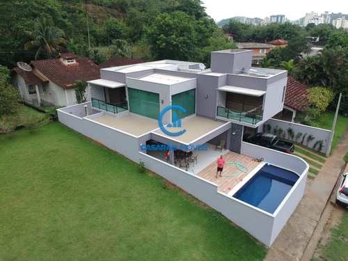 Casa, código 1049 em Caraguatatuba, bairro Martim de Sá