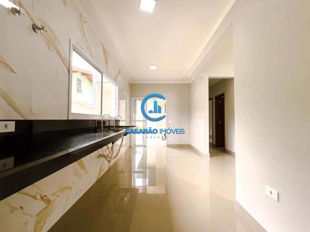 Casa em Caraguatatuba, no bairro Massaguaçu