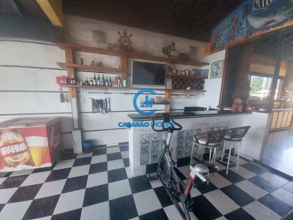 Casa em Caraguatatuba, no bairro Massaguaçu