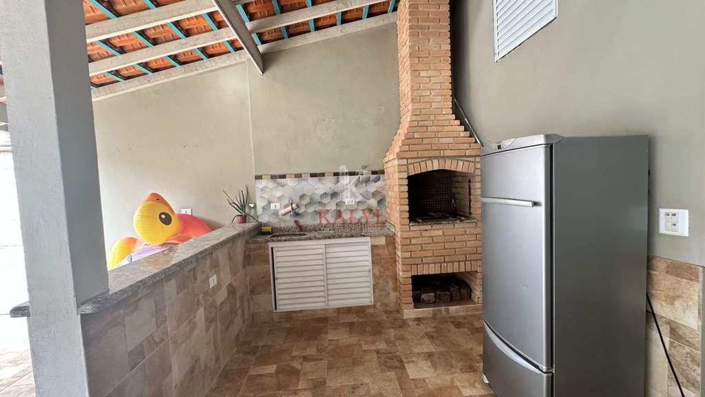 Casa em Praia Grande, no bairro Real
