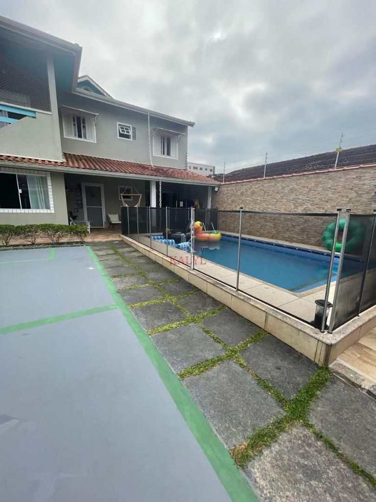 Casa em Praia Grande, no bairro Real