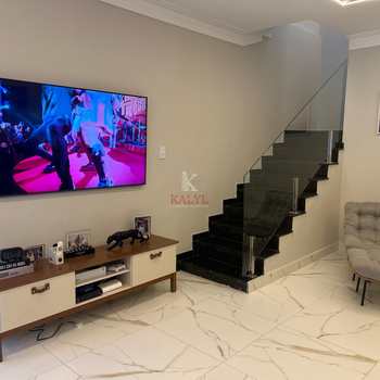 Casa em Praia Grande, bairro Tupi