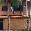 Sobrado em Praia Grande, bairro Guilhermina