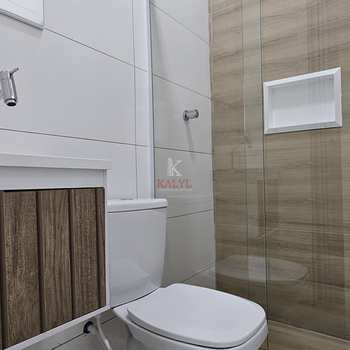 Casa em Praia Grande, bairro Caiçara