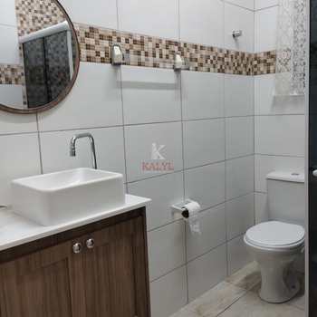 Casa em Praia Grande, bairro Caiçara