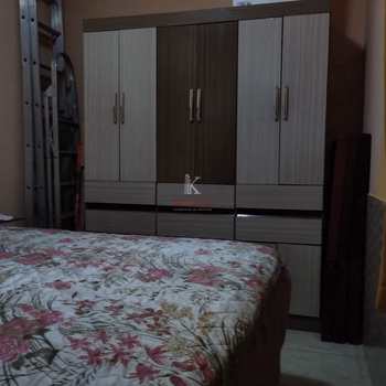 Casa em Praia Grande, bairro Caiçara