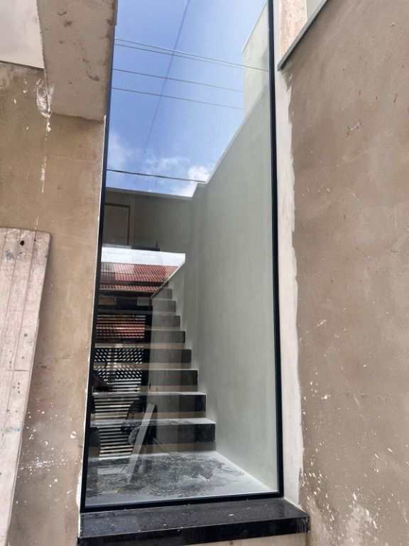Casa em Praia Grande, no bairro Boqueirão