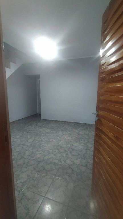 Sobrado em Praia Grande, no bairro Nova Mirim