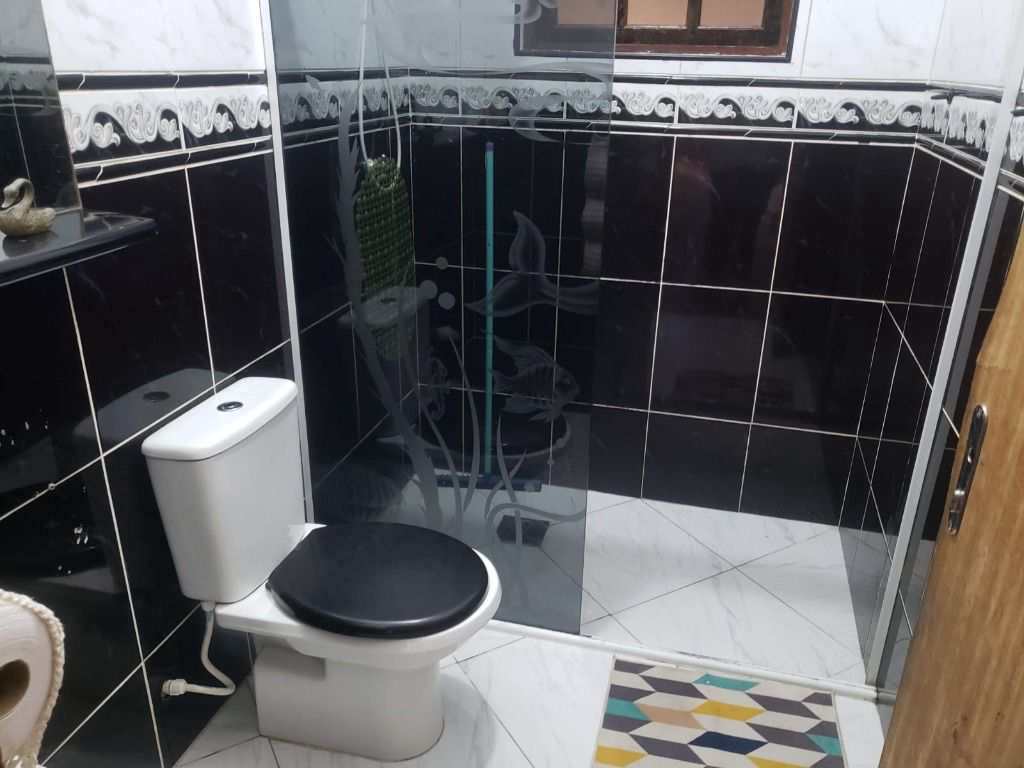 Casa em Praia Grande, no bairro Canto do Forte