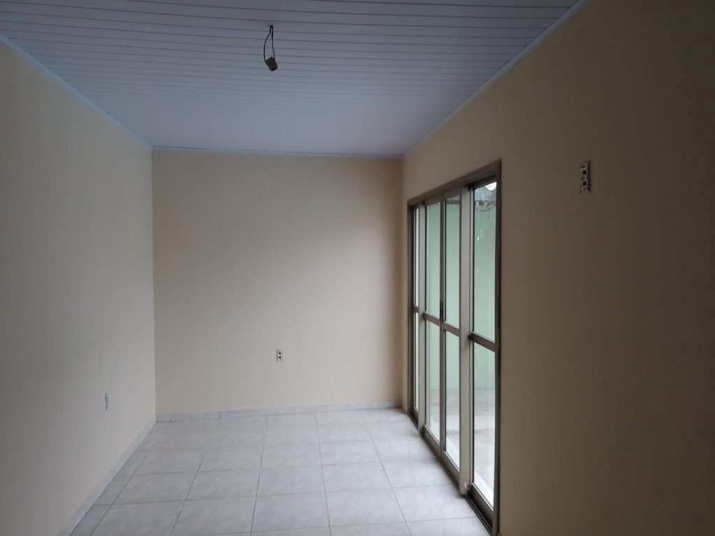 Casa em Praia Grande, no bairro Ocian