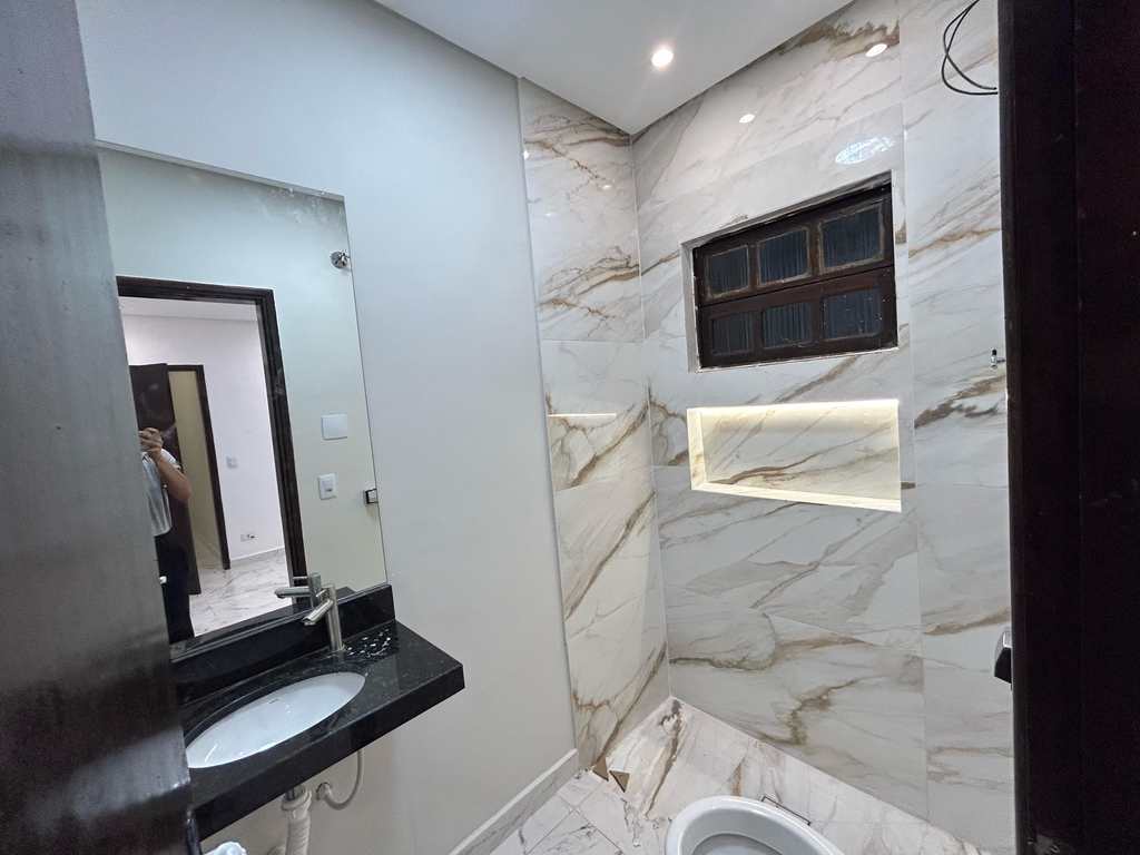 Casa em Praia Grande, no bairro Caiçara