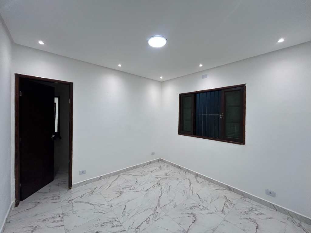 Casa em Praia Grande, no bairro Caiçara