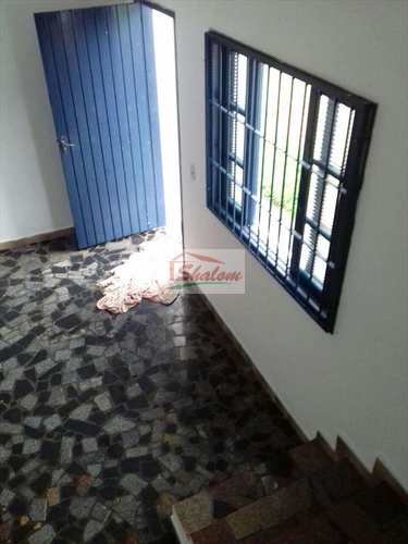 Sobrado, código 989 em Caraguatatuba, bairro Jardim Aruan