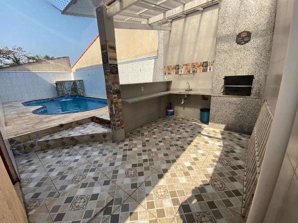 Casa em Praia Grande, no bairro Caiçara