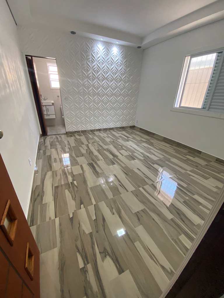 Casa em Praia Grande, no bairro Caiçara