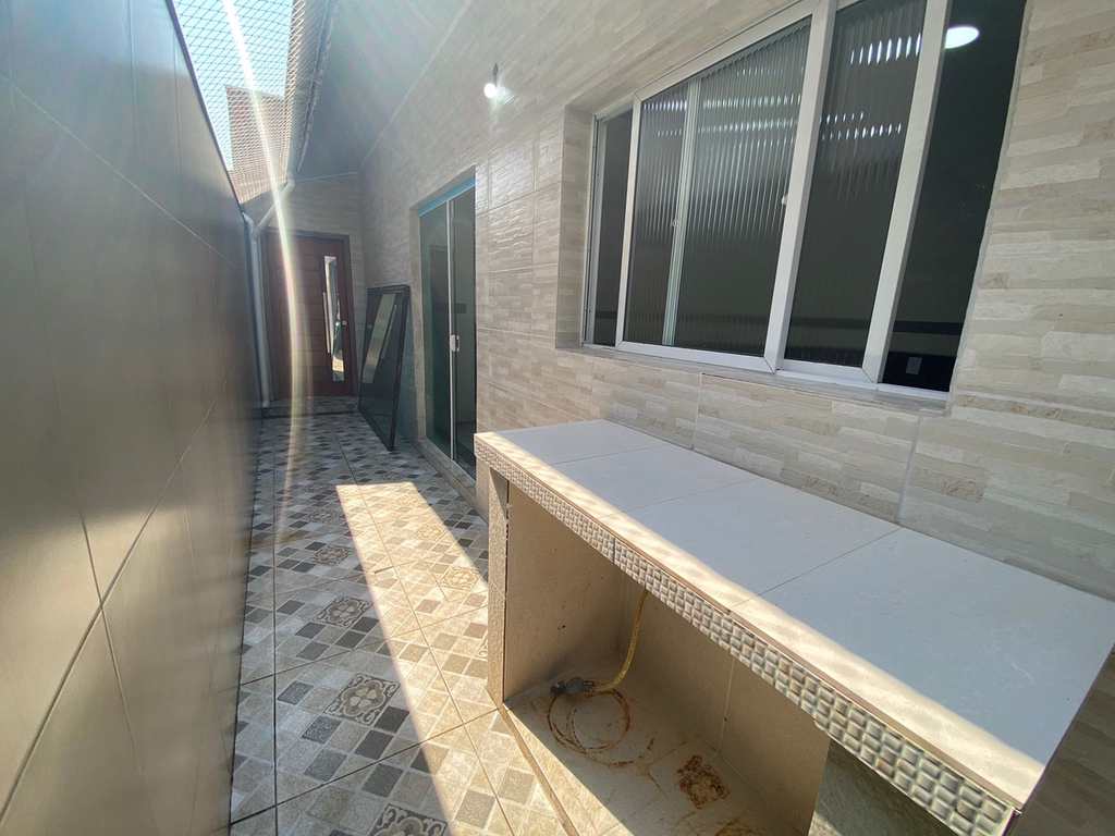 Casa em Praia Grande, no bairro Caiçara