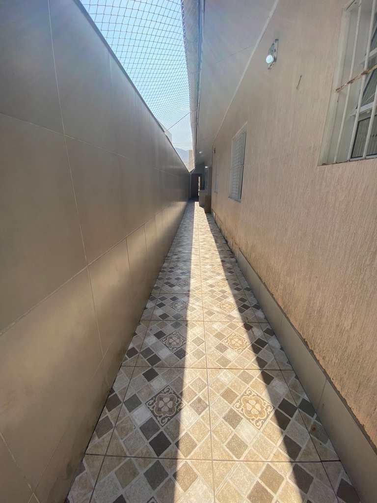 Casa em Praia Grande, no bairro Caiçara