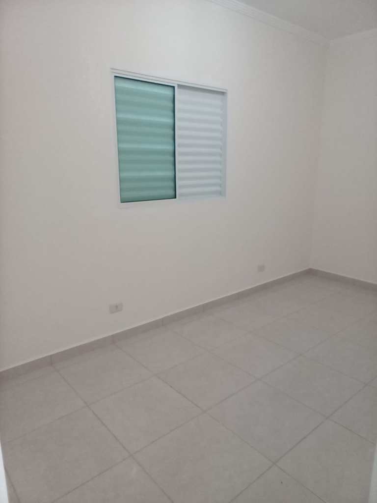Casa em Praia Grande, no bairro Caiçara
