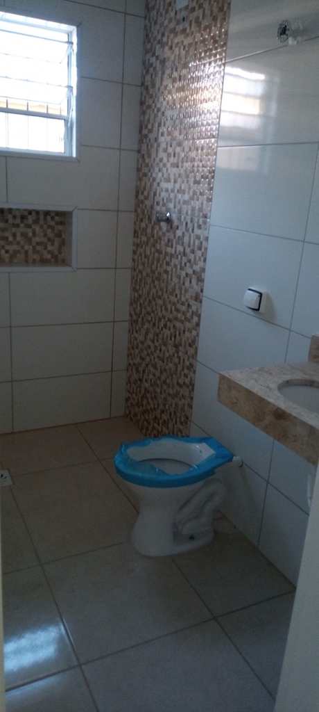 Casa em Praia Grande, no bairro Caiçara