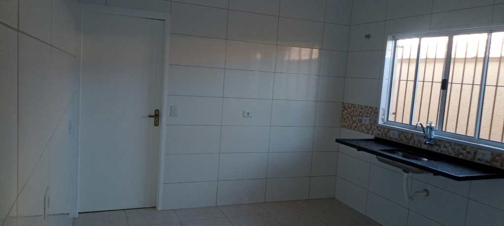 Casa em Praia Grande, no bairro Caiçara