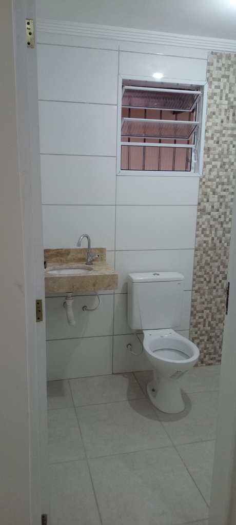 Casa em Praia Grande, no bairro Caiçara