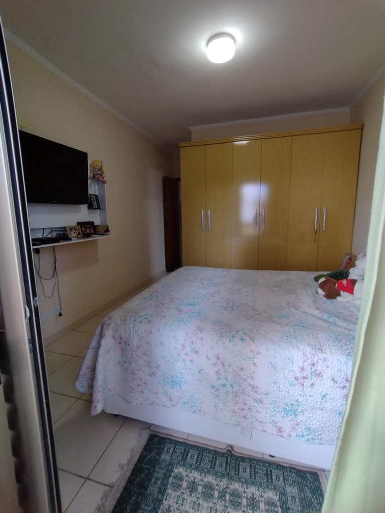 Sobrado em Praia Grande, no bairro Canto do Forte