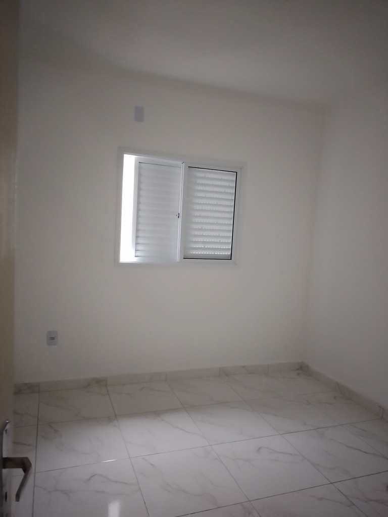 Casa de Condomínio em Praia Grande, no bairro Tude Bastos