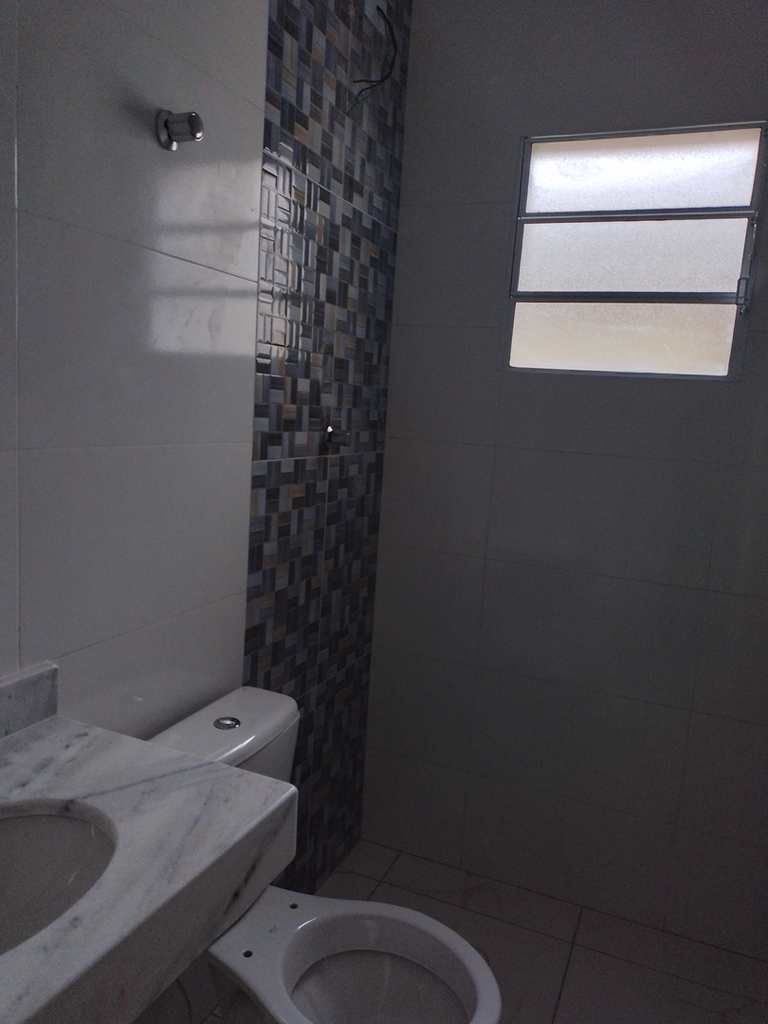Casa de Condomínio em Praia Grande, no bairro Tude Bastos