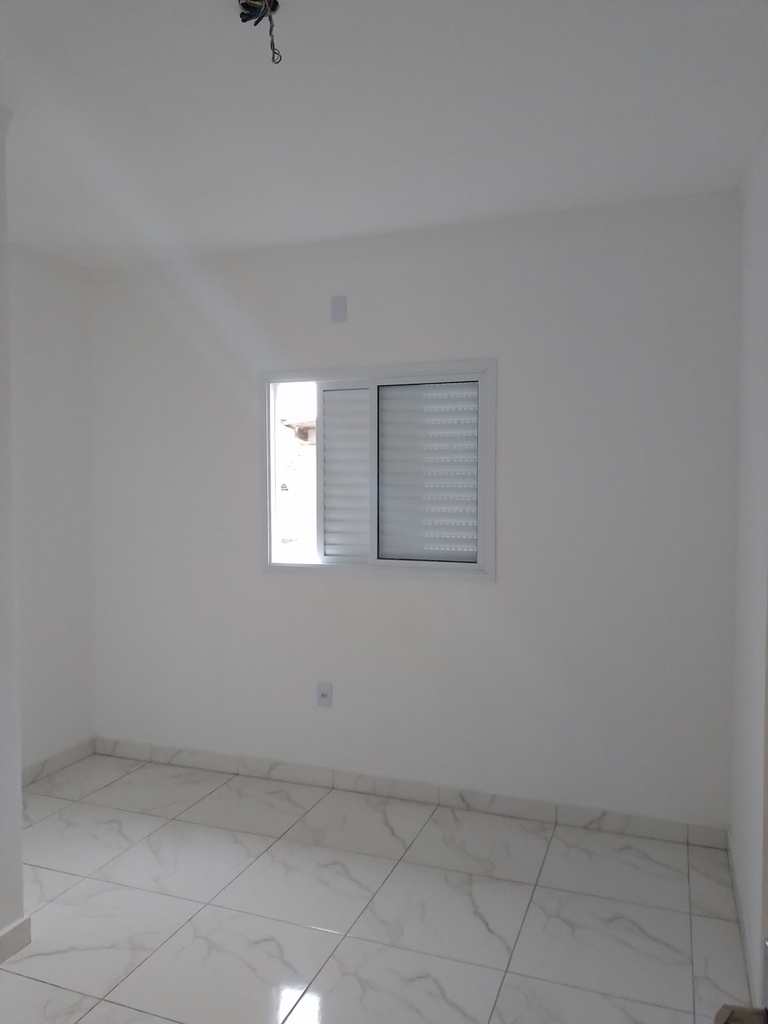 Casa de Condomínio em Praia Grande, no bairro Tude Bastos