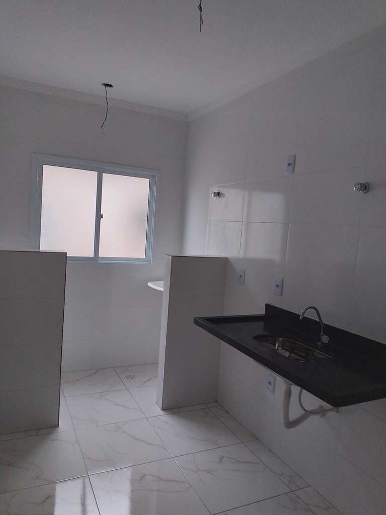 Casa de Condomínio em Praia Grande, no bairro Tude Bastos