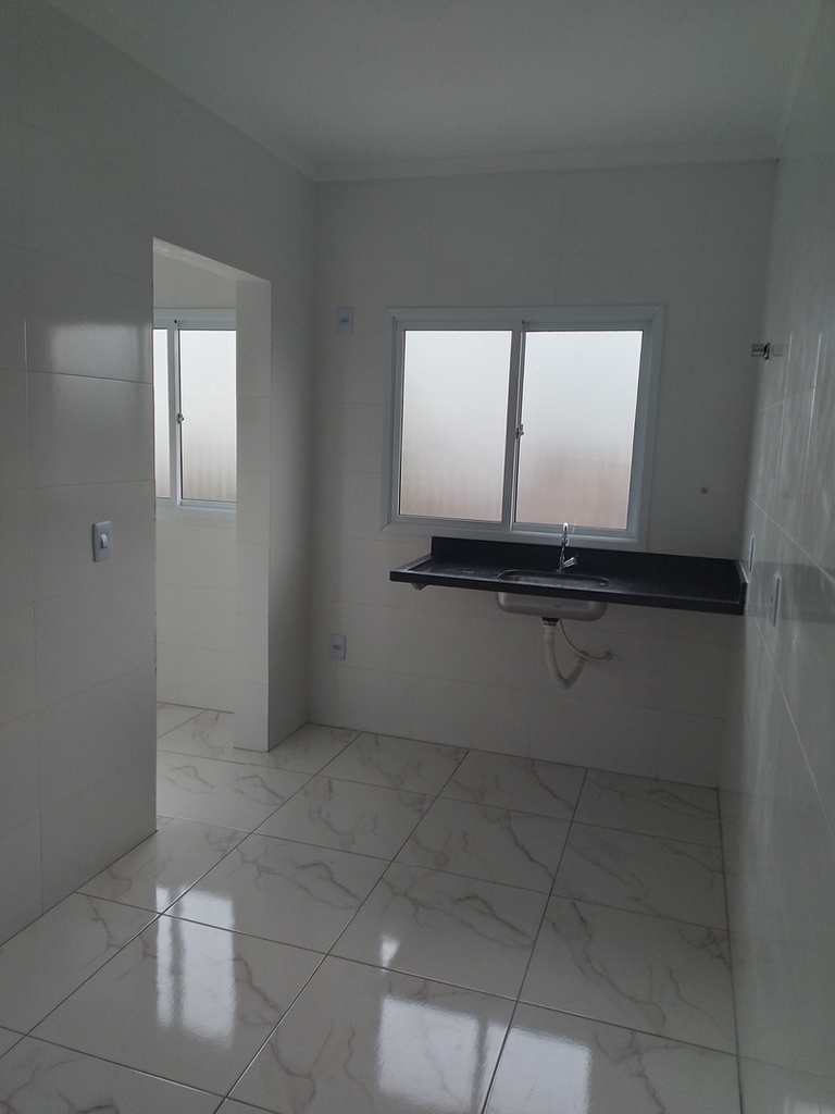 Casa de Condomínio em Praia Grande, no bairro Tude Bastos